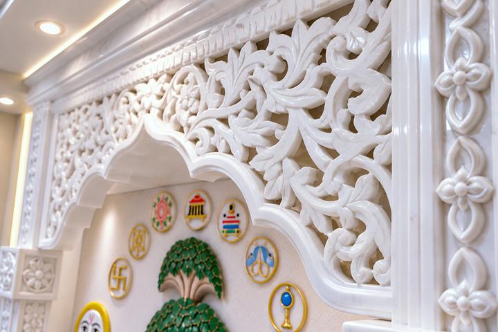 Close-up of hand-carved marble jali arch